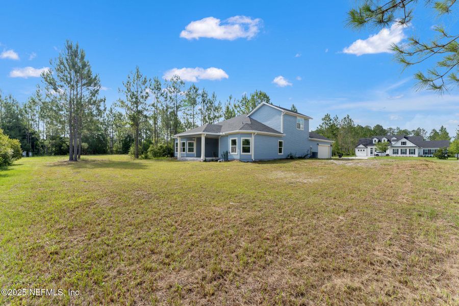 Front exterior of a new home in , Jacksonville, FL, highlighting curb appeal (Image 21).