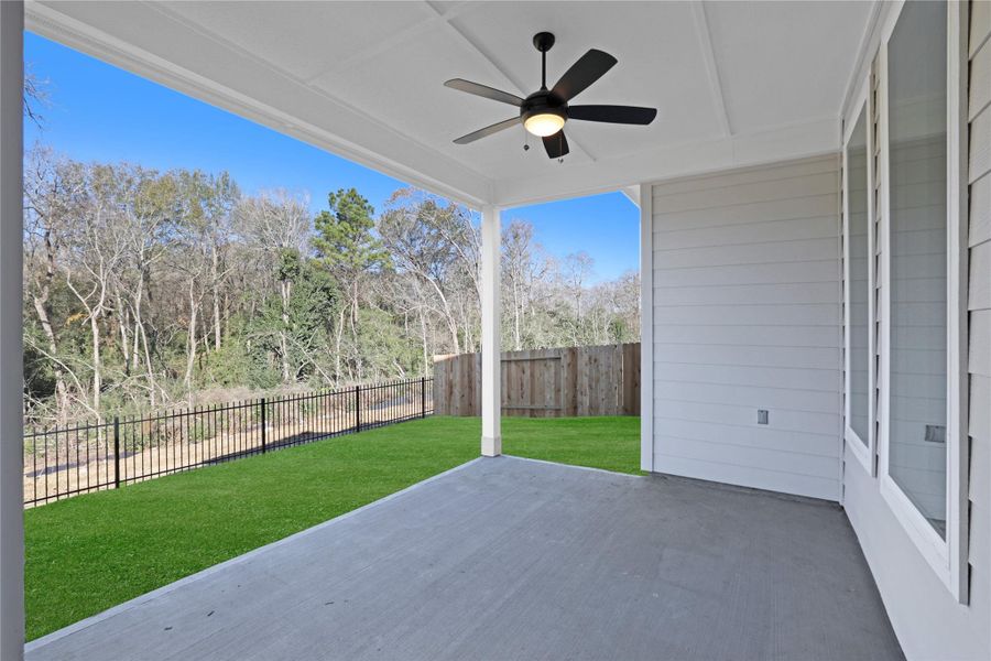 Exterior details and patio area of a home in Lexington Heights, Willis (Image 4). Exterior details and patio area of a home in Lexington Heights, Willis (Image 4).