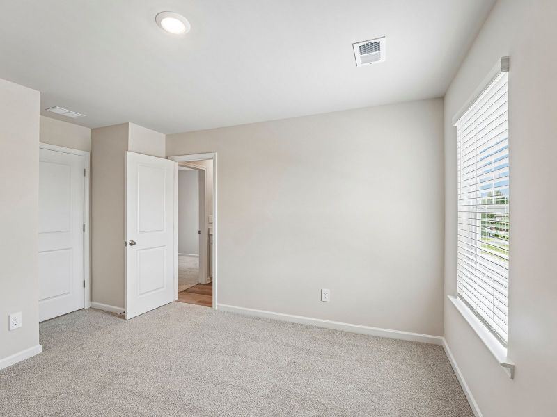 Spacious, unfurnished interior of a new home in Artisan Walk, Fairburn (Image 16).