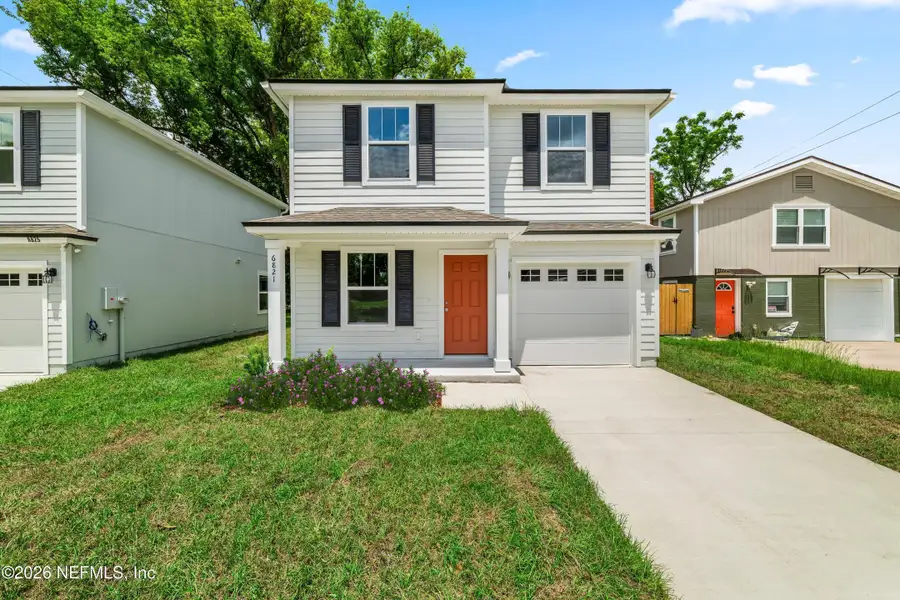 Front exterior of a new home in , Jacksonville, FL, highlighting curb appeal (Image 2). Front exterior of a new home in , Jacksonville, FL, highlighting curb appeal (Image 2).