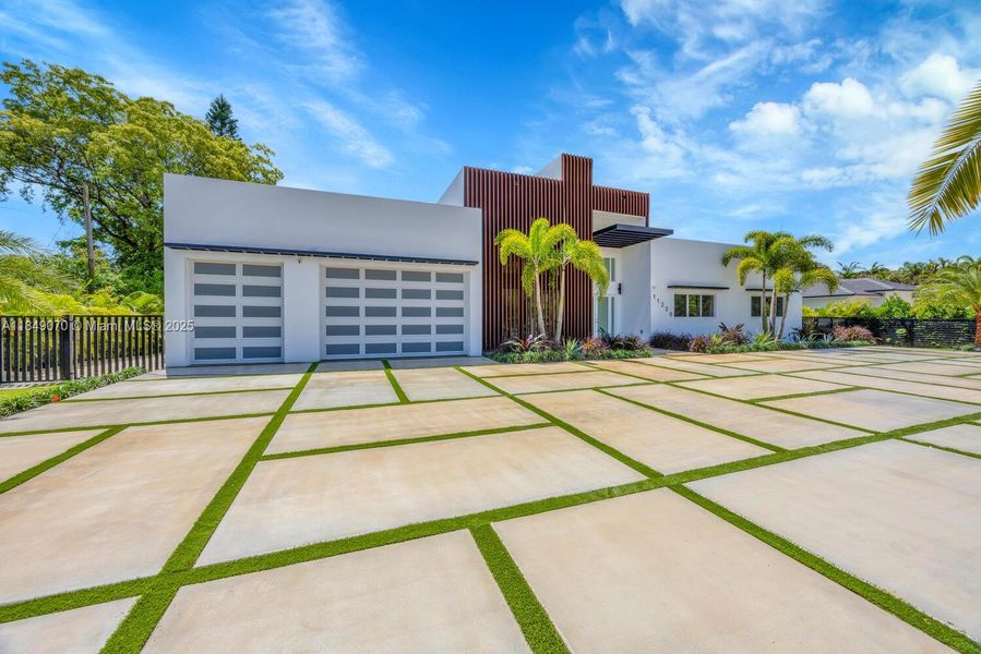 Front exterior of a new home in , Miami, FL, highlighting curb appeal (Image 22).