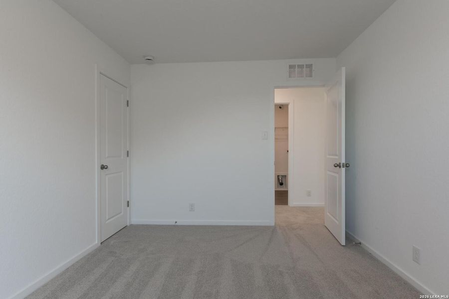 Spacious, unfurnished interior of a new home in Hennersby Hollow, San Antonio (Image 21).