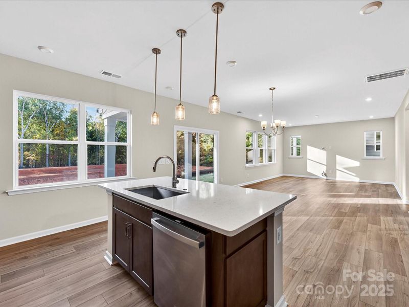 Large Central Island with Quartz Countertops. Large Central Island with Quartz Countertops.