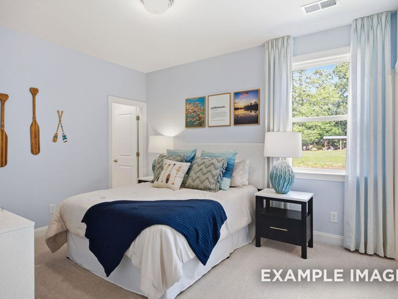 Furnished interior view inside a new home in Addison West, Holly Springs (Image 12).