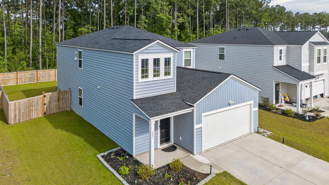 Front exterior of a new home in Cypress Preserve, Moncks Corner, SC, highlighting curb appeal (Image 28).