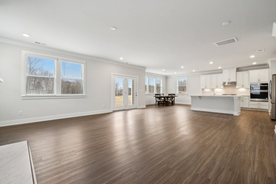 A large empty kitchen. A large empty kitchen.