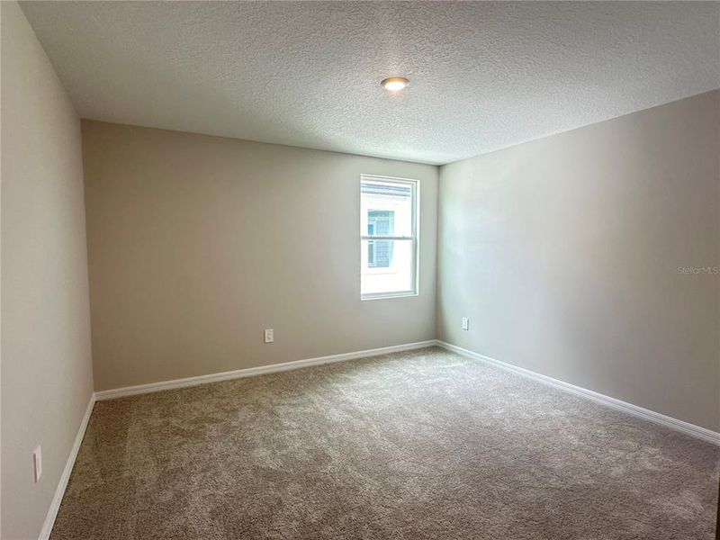 Spacious, unfurnished interior of a new home in Berry Bay, Wimauma (Image 28).
