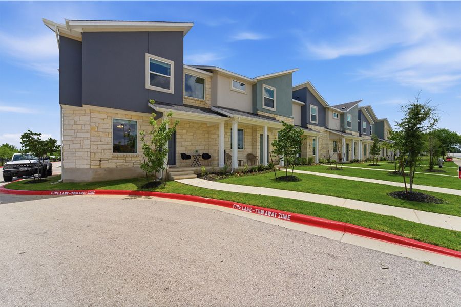 Representative exterior photo of a completed home built from the Kahn by CastleRock Communities in Municipal Drive Townhomes, Leander, TX (Image 2).