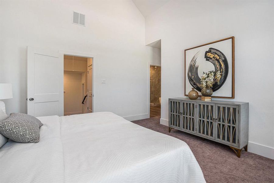 High Ceilings & Spacious Primary Bedroom. Model Home Finishes may vary.