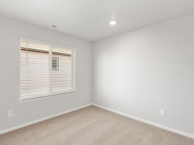 Spacious, unfurnished interior of a new home in Lorson Ranch: The Trail Collection, Colorado Springs (Image 14).