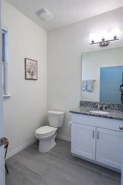 Furnished interior view inside a new home in Waterleigh, Winter Garden (Image 13).