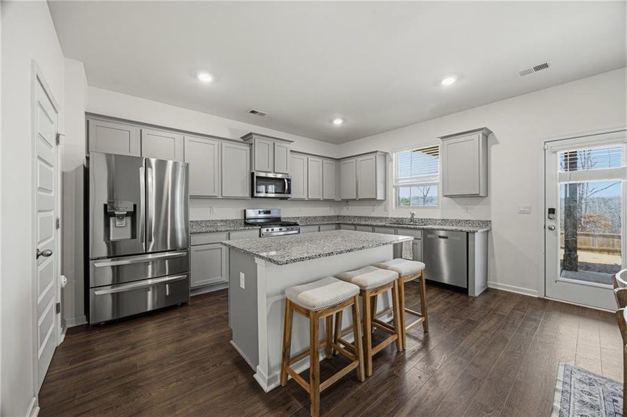 Furnished interior view inside a new home in The Enclave at Flat Rock Hills, Stonecrest (Image 12).