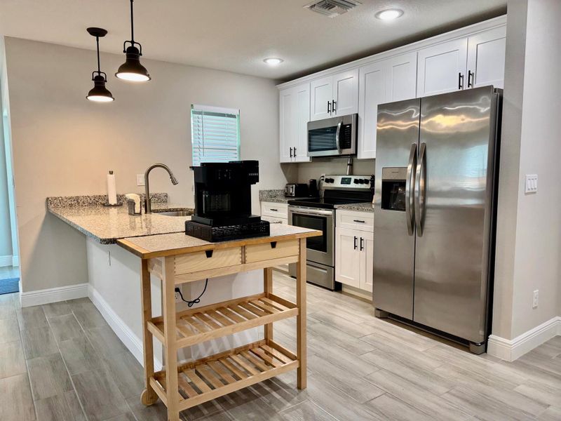 Furnished interior view inside a new home in , Okeechobee (Image 5).