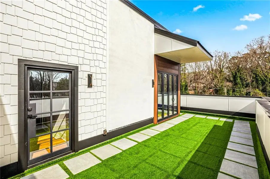Exterior details and patio area of a home in , Atlanta (Image 3).
