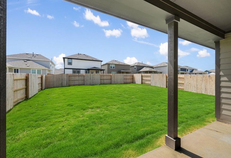 Exterior details and patio area of a home in Patterson Ranch, Georgetown (Image 25).