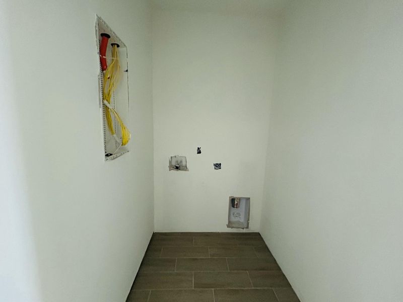 Spacious, unfurnished interior of a new home in The Domus Collection at Midtown Nexton, Summerville (Image 23).