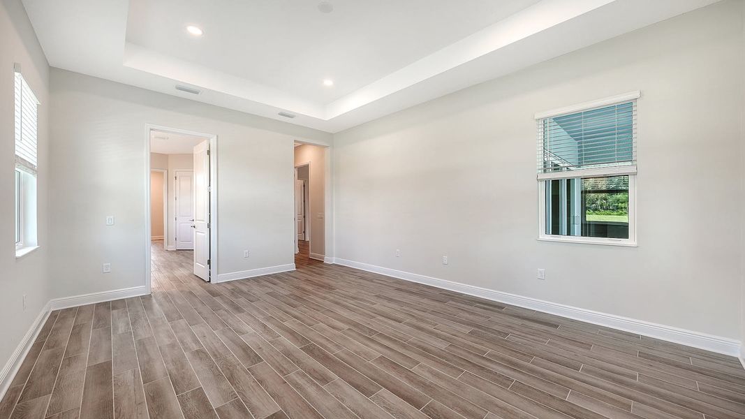 Spacious, unfurnished interior of a new home in Canoe Creek Real Estate and Homes for Sale in Parrish, FL - Neal Communities, Parrish (Image 53).