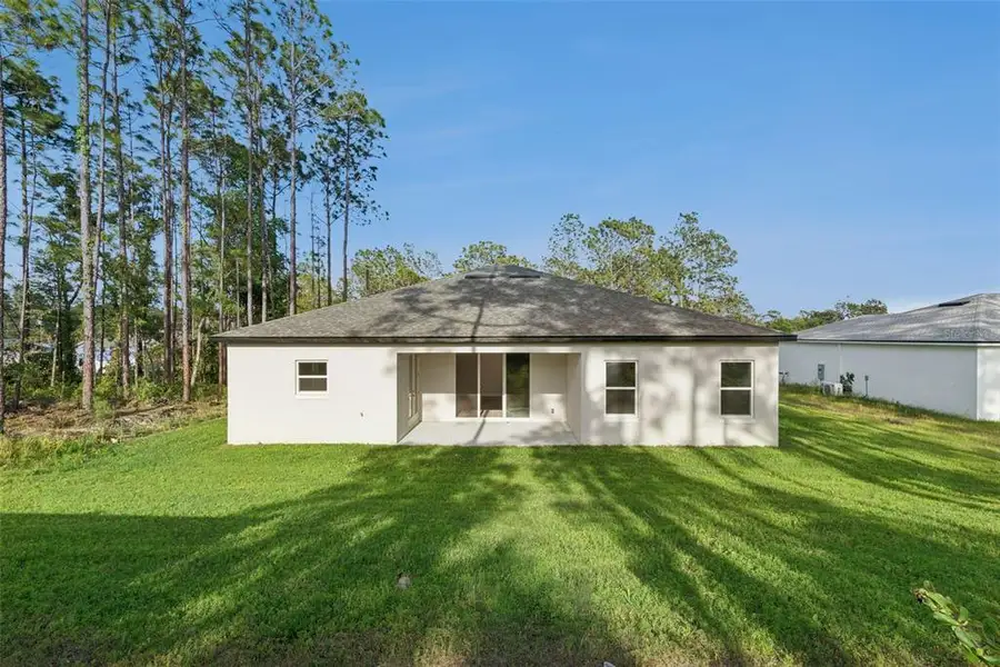 Exterior details and patio area of a home in , Ocala (Image 3).