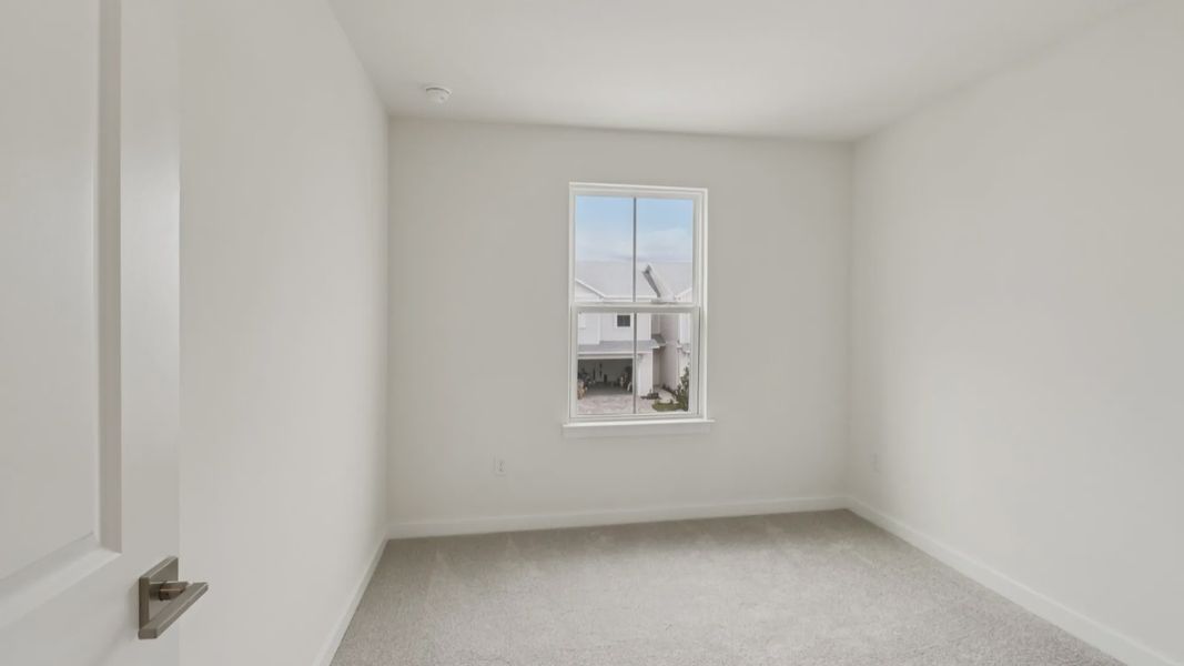 Furnished interior view inside a new home in Cyrene at Harmony, St. Cloud (Image 27).