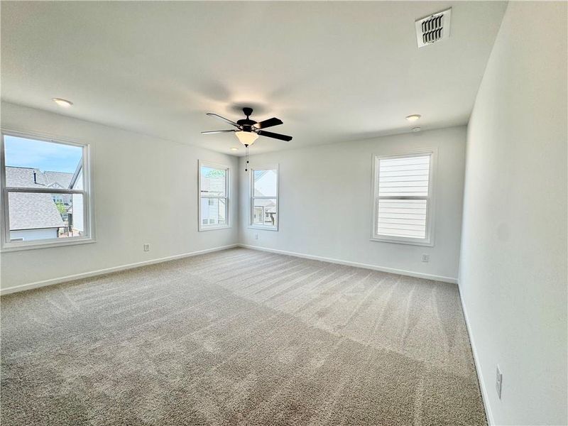 Spacious, unfurnished interior of a new home in Eastlyn Crossing, Flowery Branch (Image 25).