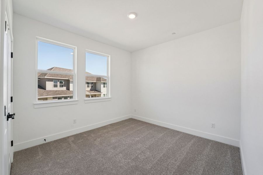 Spacious, unfurnished interior of a new home in Avery Centre, Round Rock (Image 24).