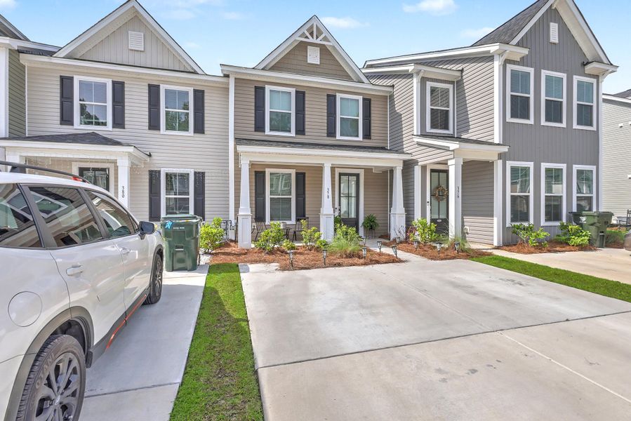 Front exterior of a new home in , Summerville, SC, highlighting curb appeal (Image 21).