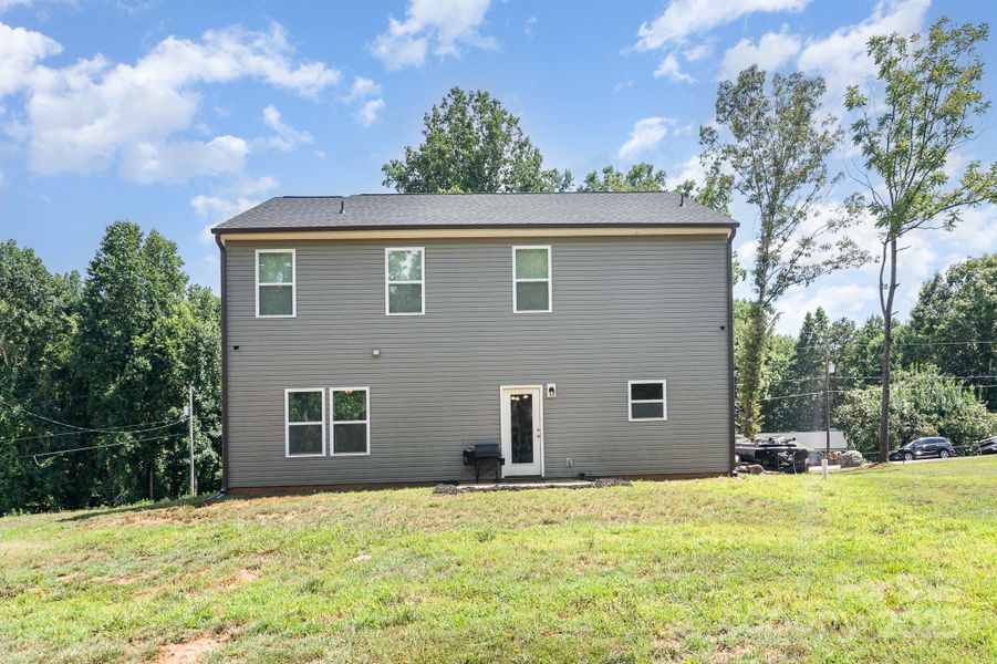 Front exterior of a new home in , Gastonia, NC, highlighting curb appeal (Image 19). Front exterior of a new home in , Gastonia, NC, highlighting curb appeal (Image 19).