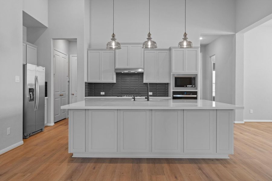 Furnished interior view inside a new home in Bridgeland 55', Cypress (Image 6).