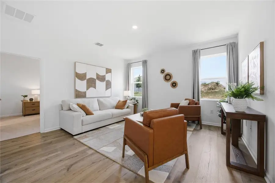 Furnished interior view inside a new home in , Okahumpka (Image 9).