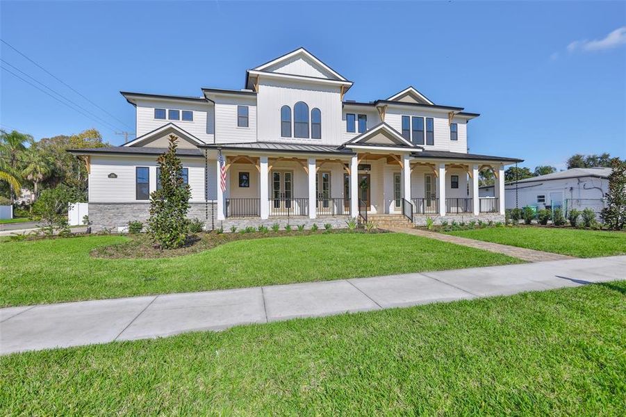 Front exterior of a new home in , Tampa, FL, highlighting curb appeal (Image 31).