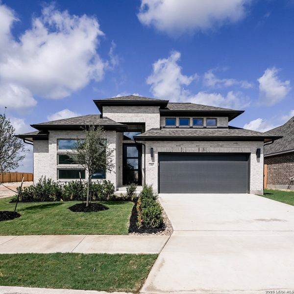 Front exterior of a new home in Legacy at Lake Dunlap, New Braunfels, TX, highlighting curb appeal (Image 20).