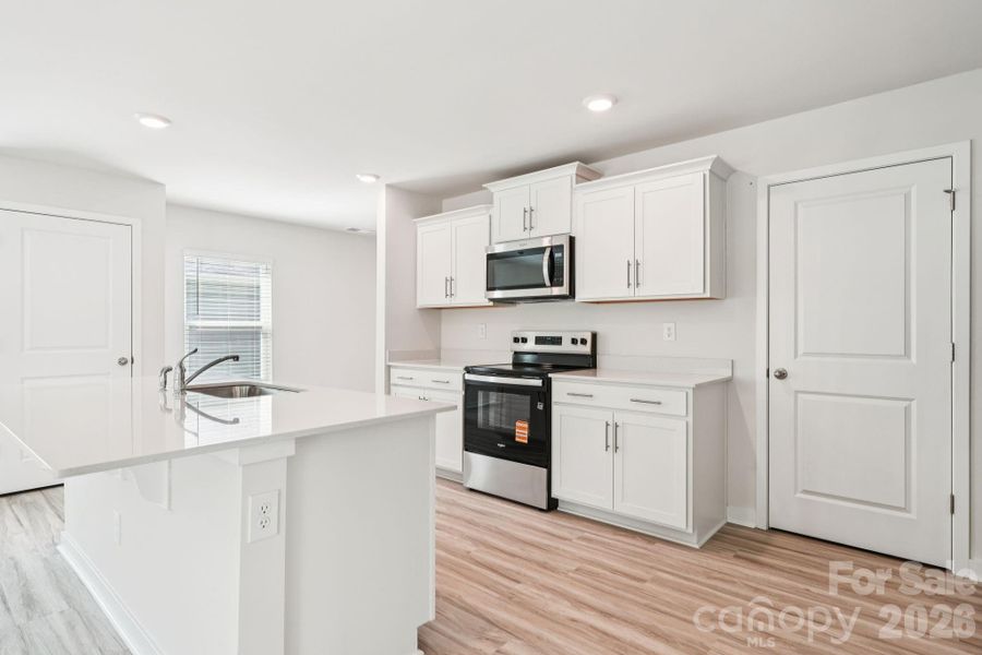 Furnished interior view inside a new home in Woodhaven at Chester, Chester (Image 11).