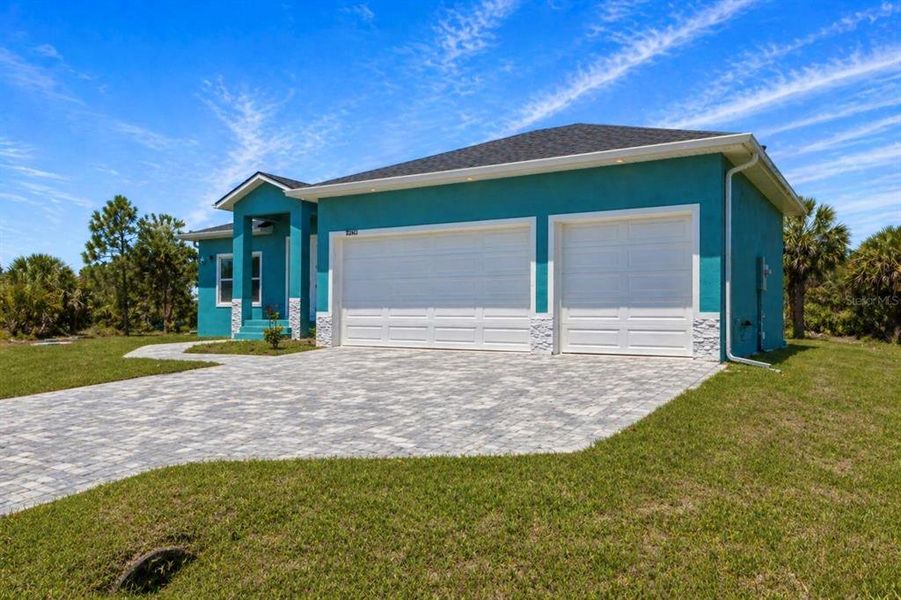 Front exterior of a new home in , Port Charlotte, FL, highlighting curb appeal (Image 23).