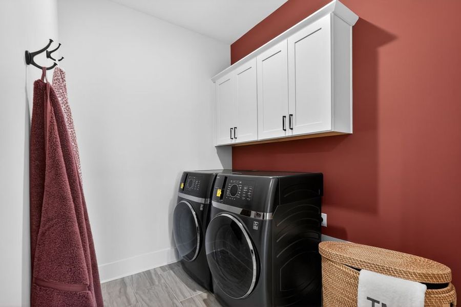 Furnished interior in a model home at Wayt Farm in Cumming (Image 25).
