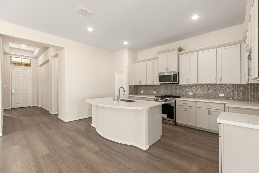 Furnished interior view inside a new home in Westland Ranch, League City (Image 9).