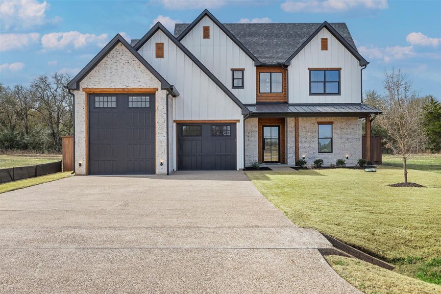 Front exterior of a new home in , Somerville, TX, highlighting curb appeal (Image 25).