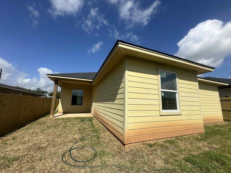 Exterior details and patio area of a home in , Clute (Image 1). Exterior details and patio area of a home in , Clute (Image 1).