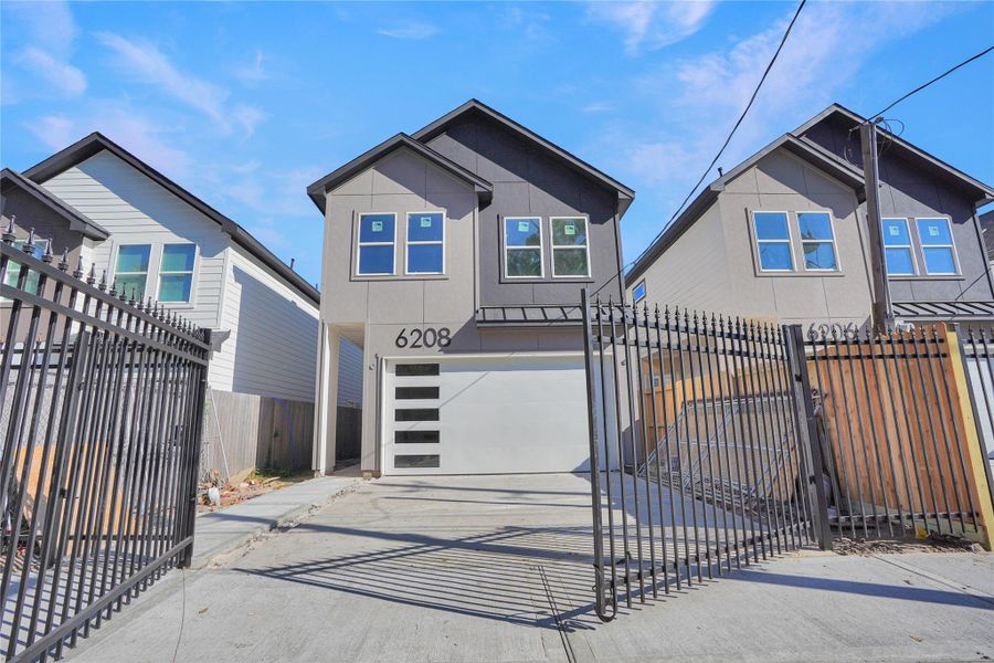Front exterior of a new home in , Houston, TX, highlighting curb appeal (Image 14).