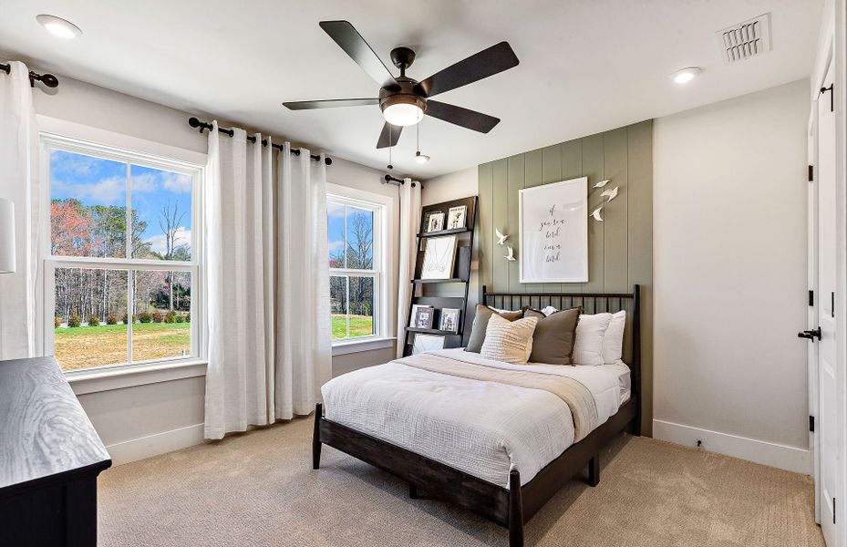 Representative furnished interior of a home built from the Woodward by Pulte Homes in Riversprings, Dacula (Image 13).