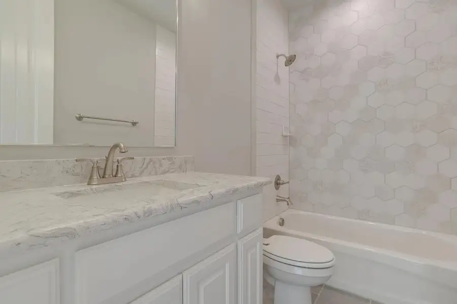 Furnished interior in a model home at Matthews Farm in Venus (Image 24). Furnished interior in a model home at Matthews Farm in Venus (Image 24).