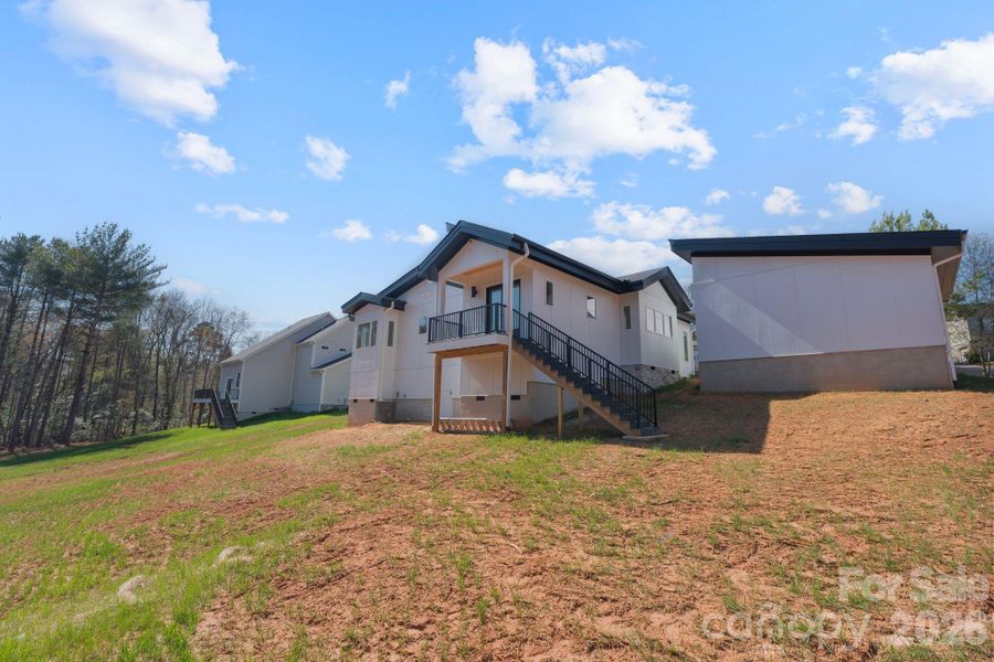Exterior details and patio area of a home in , Hickory (Image 24).