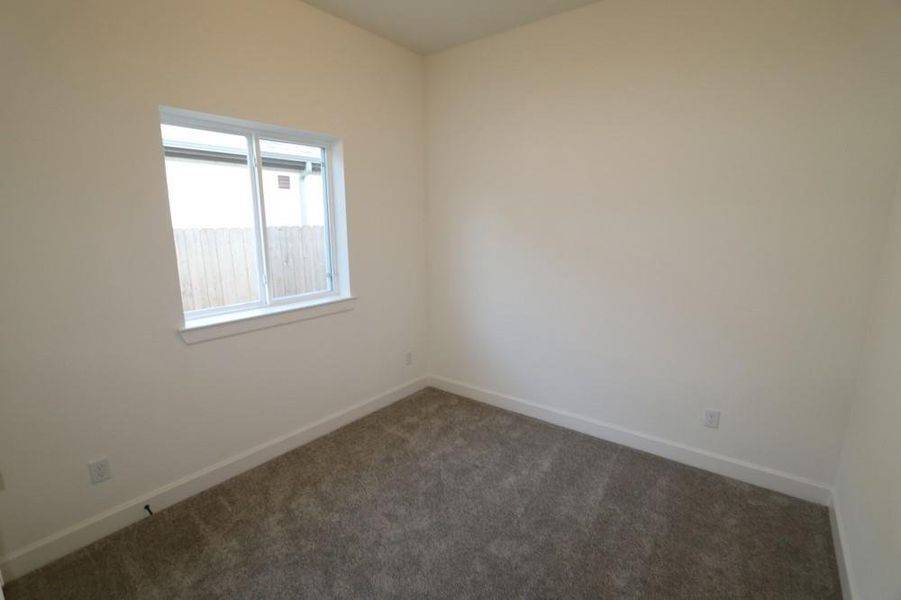 Spacious, unfurnished interior of a new home in Harvest Green 45', Richmond (Image 11).