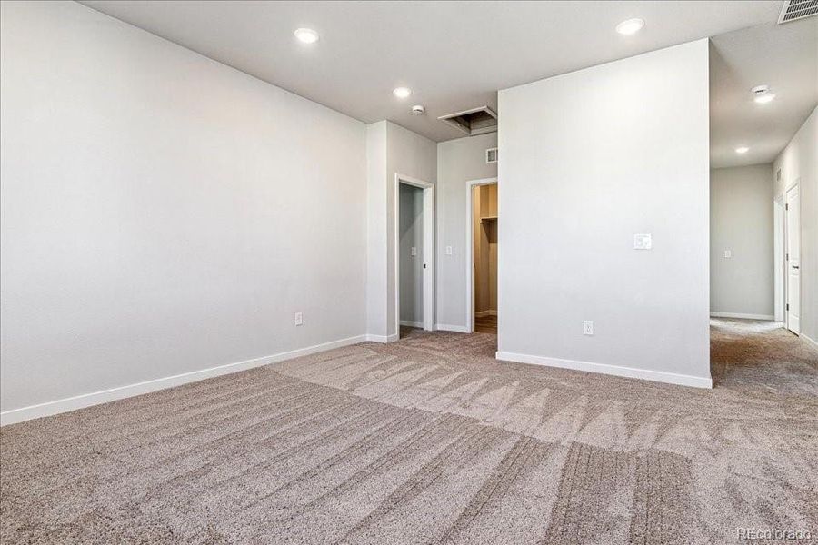 Spacious, unfurnished interior of a new home in Floret Collection at Alder Creek, Parker (Image 9).