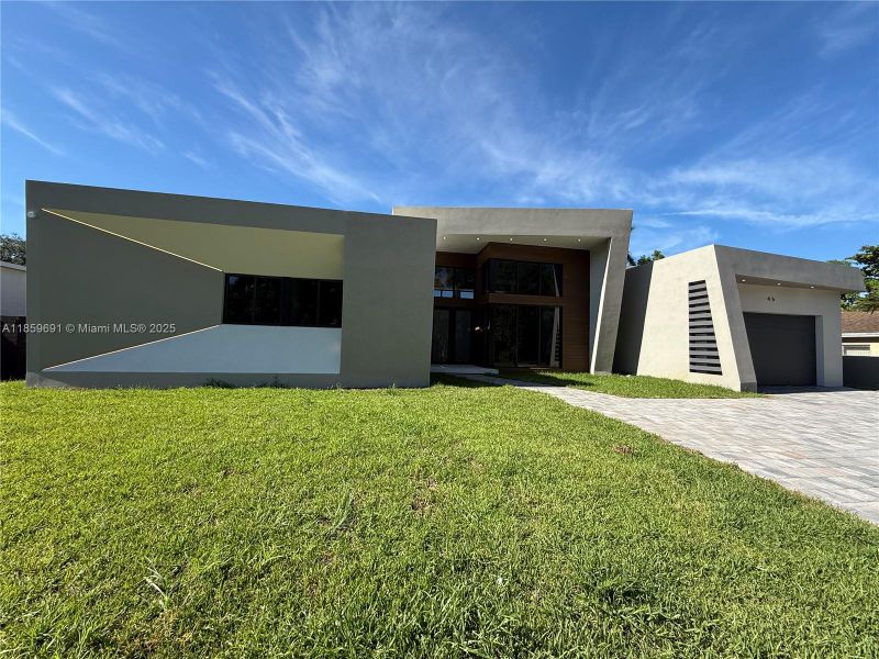 Front exterior of a new home in , Miami, FL, highlighting curb appeal (Image 29).