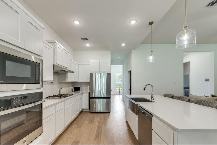 Furnished interior view inside a new home in Deer Pines, Conroe (Image 14).