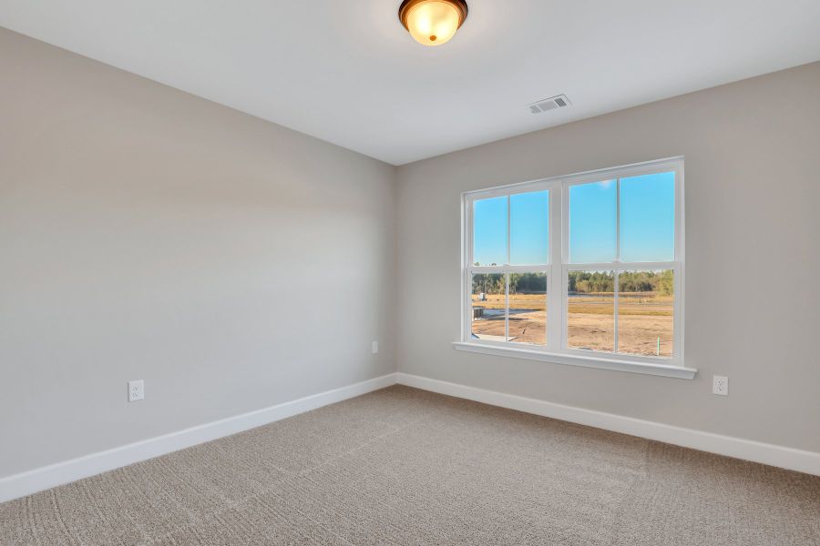 Spacious, unfurnished interior of a new home in New Haven At Belmont Glen, Guyton (Image 28).