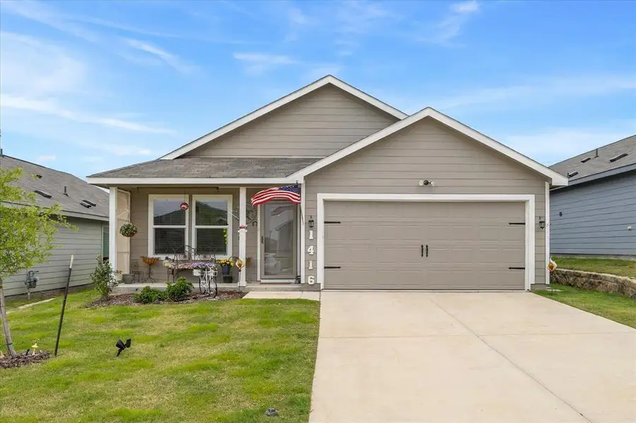 Front exterior of a new home in Eastland, Crandall, TX, highlighting curb appeal (Image 23).