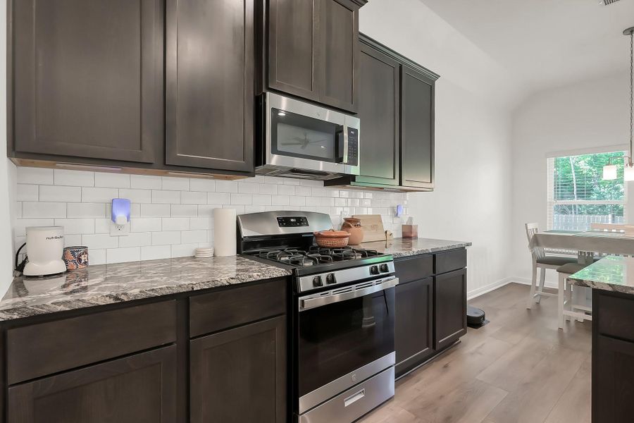 Furnished interior view inside a new home in Lexington Heights, Willis (Image 15).