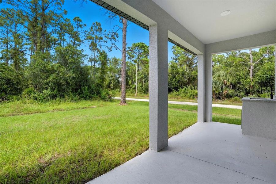 Exterior details and patio area of a home in , Lehigh Acres (Image 1).