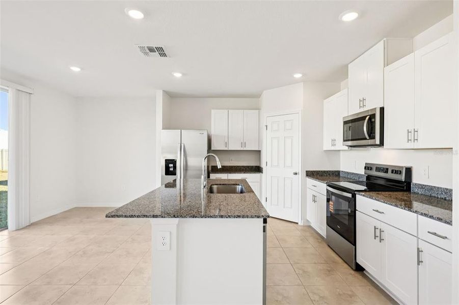 Furnished interior view inside a new home in , Poinciana (Image 10).